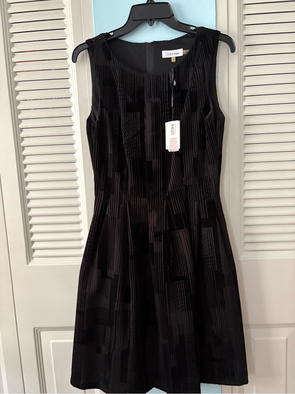 NWT Calvin Klein corduroy dress with pretty pattern.